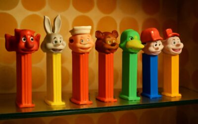 The curious tale of who made pez dispensers and the creators behind this candy legend.